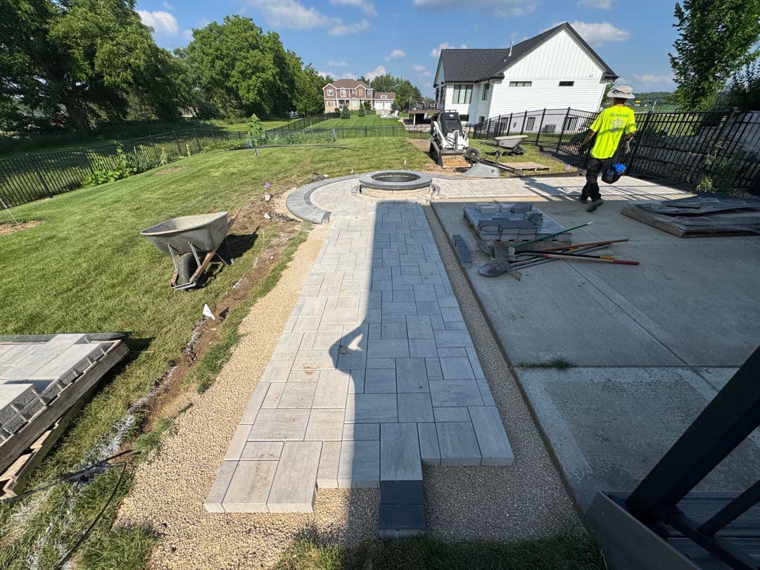 Gallery photos for Paver Patio Extension and Fire Pit Built to Handle a Sloped Backyard: Image #2