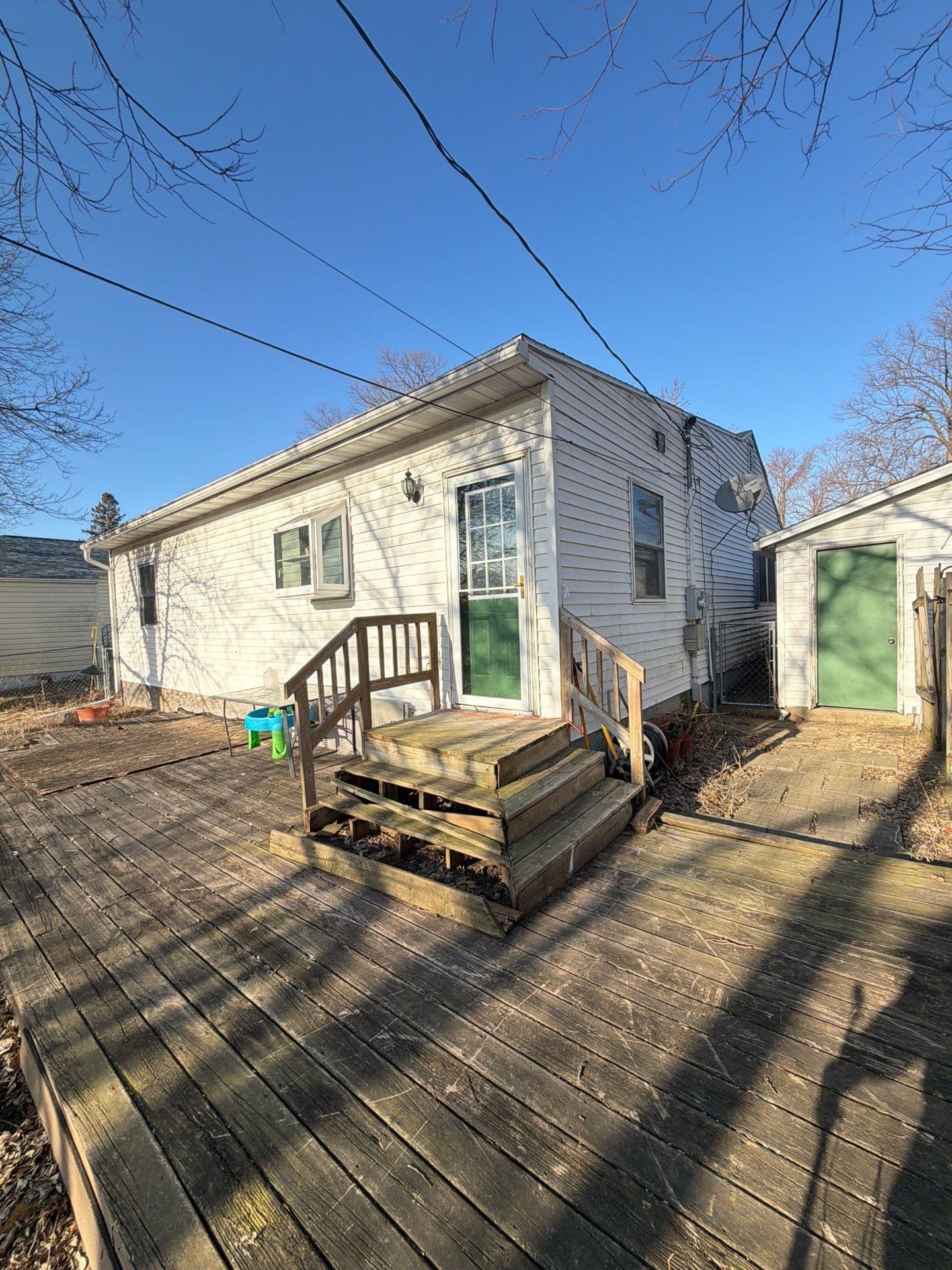 Old Rotting Deck Out, Custom Paver Patio In Madison WI