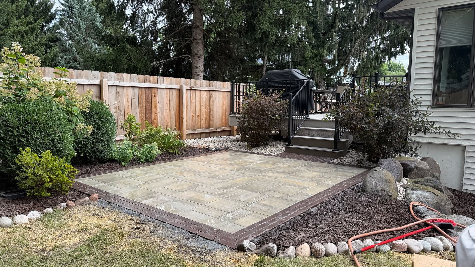 Clean Paver Patio and Low-Maintenance Backyard Done Right image